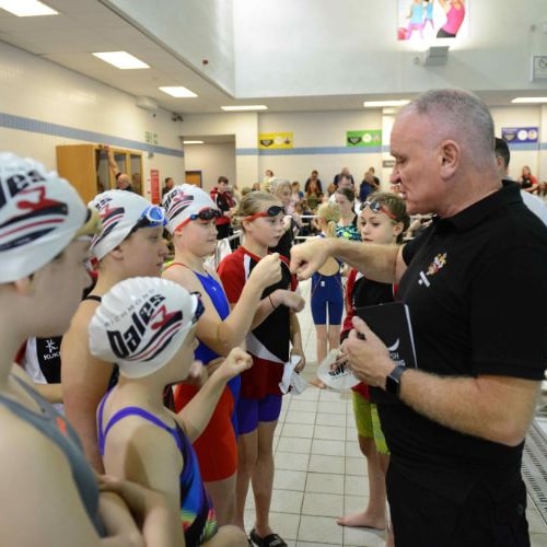 Team chat before a swim